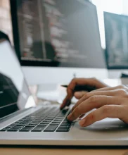 contemporary website developer man typing and writing code for program website